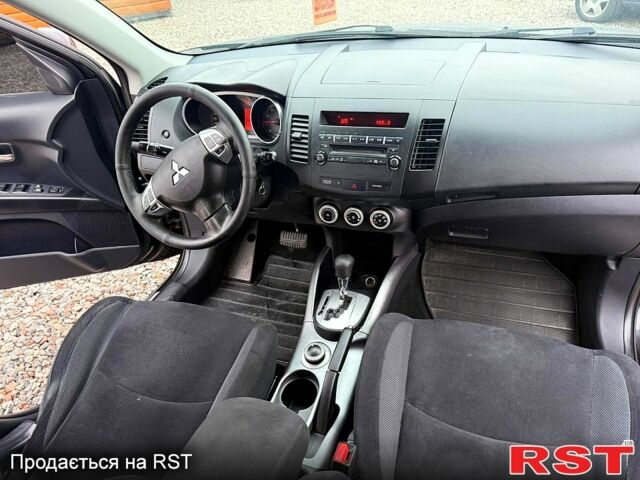 Черный Мицубиси Аутлендер, объемом двигателя 2.4 л и пробегом 200 тыс. км за 9999 $, фото 8 на Automoto.ua