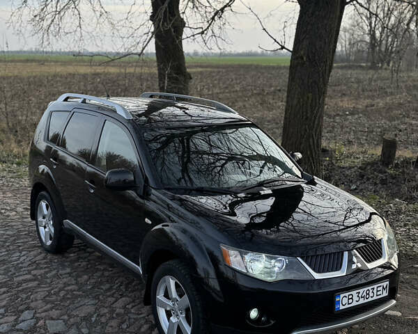 Чорний Міцубісі Аутлендер, об'ємом двигуна 2.36 л та пробігом 293 тис. км за 7900 $, фото 7 на Automoto.ua