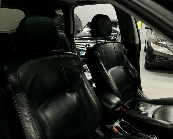 Черный Мицубиси Аутлендер, объемом двигателя 2.4 л и пробегом 230 тыс. км за 8700 $, фото 12 на Automoto.ua