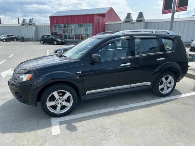 Чорний Міцубісі Аутлендер, об'ємом двигуна 2.4 л та пробігом 137 тис. км за 8999 $, фото 5 на Automoto.ua