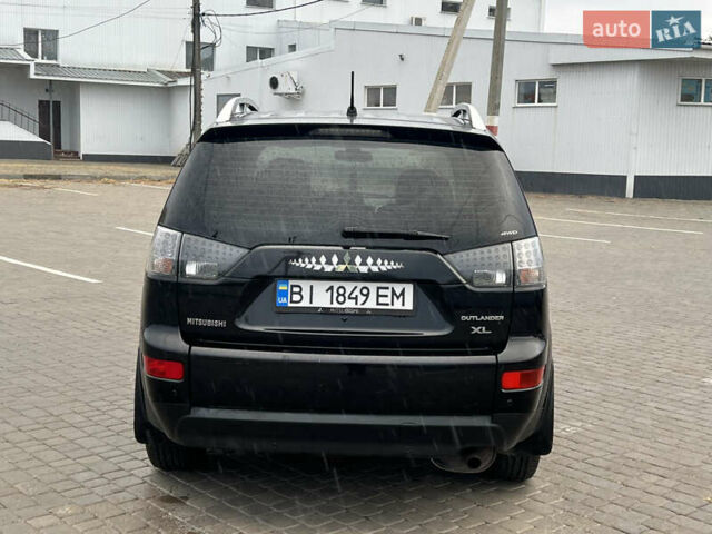 Мицубиси Аутлендер 2008 в Кременчуге на Automoto.ua Черный Мицубиси Аутлендер, объемом двигателя 2.4 л и пробегом 230 тыс. км за 6850 $, фото 24 на Automoto.ua