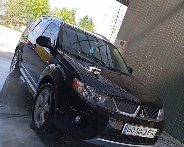 Черный Мицубиси Аутлендер, объемом двигателя 2.36 л и пробегом 203 тыс. км за 9200 $, фото 20 на Automoto.ua