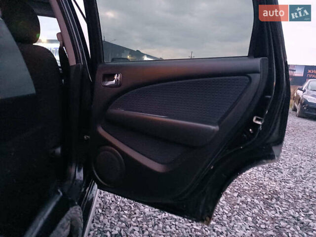 Чорний Міцубісі Аутлендер, об'ємом двигуна 2 л та пробігом 271 тис. км за 6940 $, фото 17 на Automoto.ua