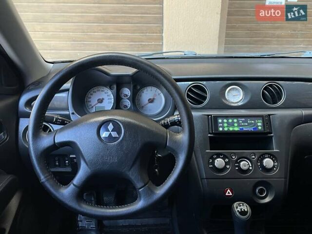 Черный Мицубиси Аутлендер, объемом двигателя 2 л и пробегом 270 тыс. км за 7199 $, фото 38 на Automoto.ua