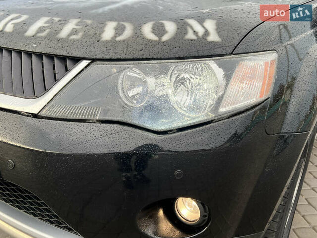 Черный Мицубиси Аутлендер, объемом двигателя 2.4 л и пробегом 230 тыс. км за 6650 $, фото 70 на Automoto.ua