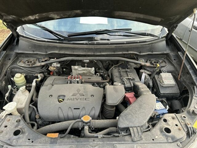 Чорний Міцубісі Аутлендер, об'ємом двигуна 2.4 л та пробігом 186 тис. км за 8700 $, фото 16 на Automoto.ua