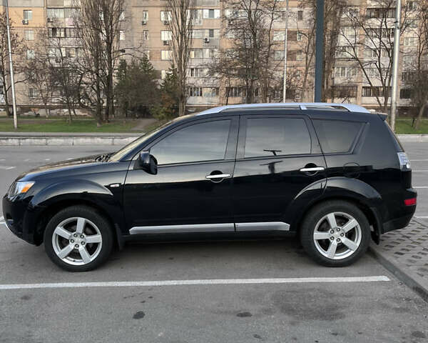 Черный Мицубиси Аутлендер, объемом двигателя 2.4 л и пробегом 237 тыс. км за 5000 $, фото 4 на Automoto.ua
