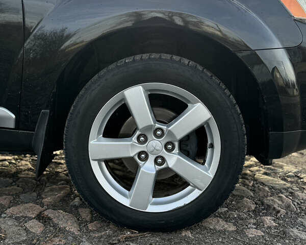 Чорний Міцубісі Аутлендер, об'ємом двигуна 2.36 л та пробігом 293 тис. км за 7900 $, фото 8 на Automoto.ua