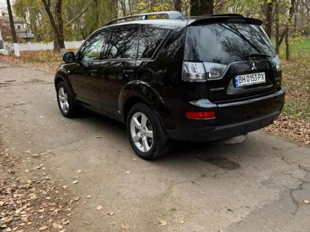 Чорний Міцубісі Аутлендер, об'ємом двигуна 3 л та пробігом 212 тис. км за 10000 $, фото 4 на Automoto.ua