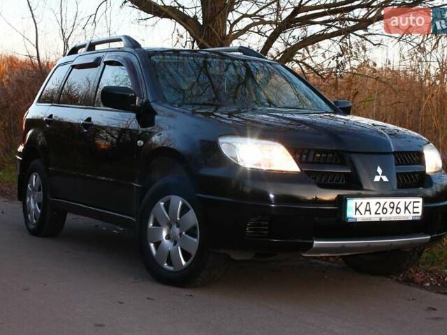 Черный Мицубиси Аутлендер, объемом двигателя 2 л и пробегом 189 тыс. км за 7200 $, фото 20 на Automoto.ua