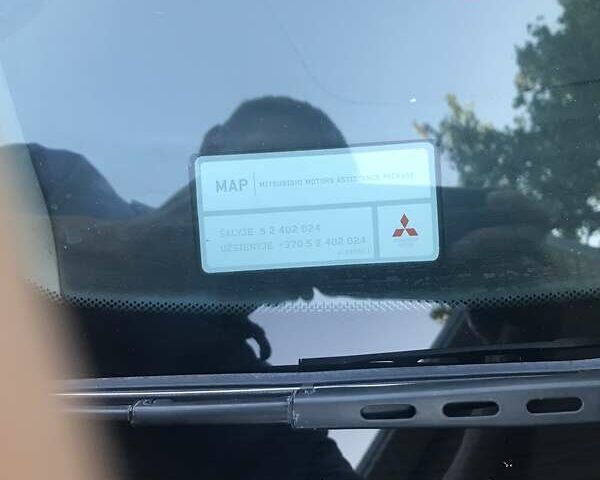 Чорний Міцубісі Аутлендер, об'ємом двигуна 2.38 л та пробігом 207 тис. км за 7000 $, фото 53 на Automoto.ua