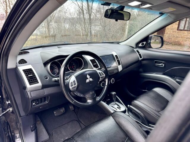 Чорний Міцубісі Аутлендер, об'ємом двигуна 2.4 л та пробігом 229 тис. км за 9790 $, фото 10 на Automoto.ua