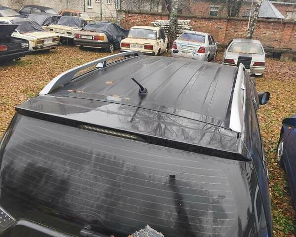 Чорний Міцубісі Аутлендер, об'ємом двигуна 2.4 л та пробігом 242 тис. км за 3400 $, фото 10 на Automoto.ua