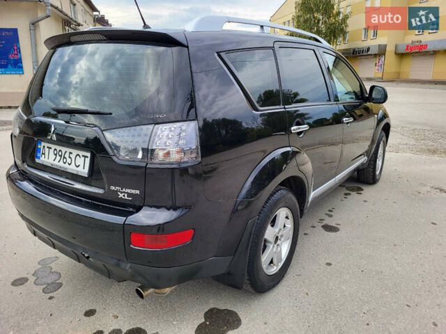 Чорний Міцубісі Аутлендер, об'ємом двигуна 2.4 л та пробігом 205 тис. км за 8400 $, фото 13 на Automoto.ua
