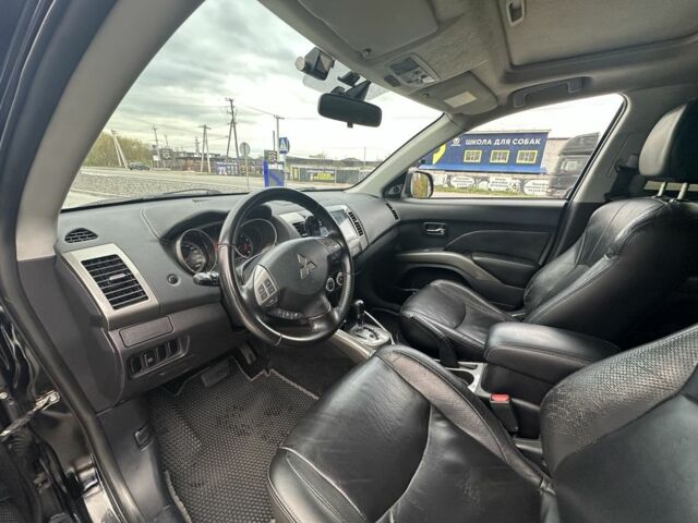 Чорний Міцубісі Аутлендер, об'ємом двигуна 2.4 л та пробігом 218 тис. км за 10000 $, фото 3 на Automoto.ua