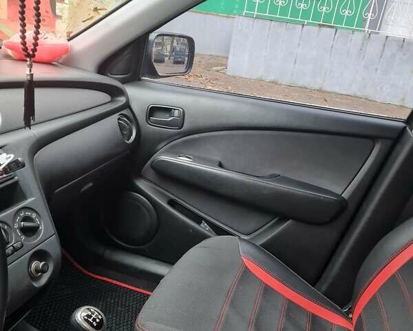 Черный Мицубиси Аутлендер, объемом двигателя 2 л и пробегом 212 тыс. км за 7900 $, фото 10 на Automoto.ua