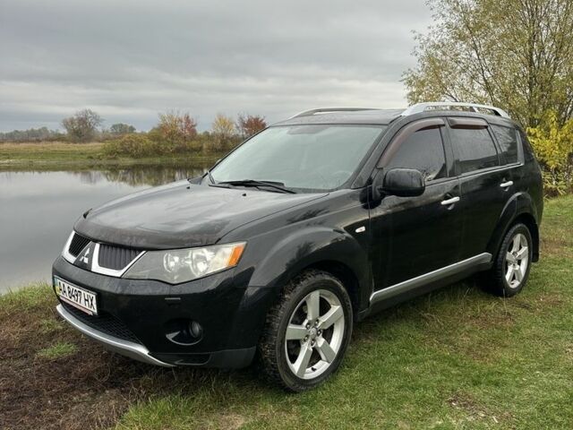 Чорний Міцубісі Аутлендер, об'ємом двигуна 2.4 л та пробігом 186 тис. км за 8700 $, фото 2 на Automoto.ua