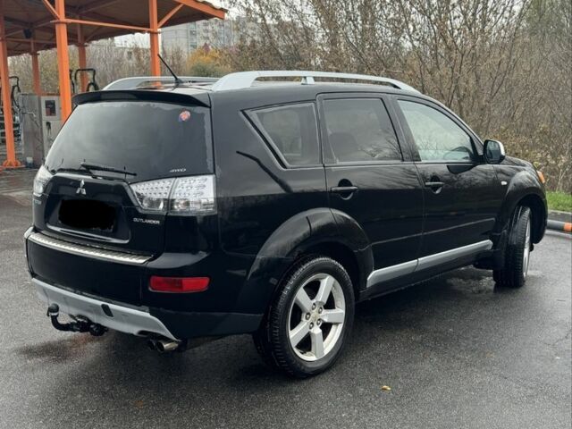 Черный Мицубиси Аутлендер, объемом двигателя 2 л и пробегом 320 тыс. км за 4800 $, фото 5 на Automoto.ua