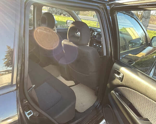 Чорний Міцубісі Аутлендер, об'ємом двигуна 2 л та пробігом 218 тис. км за 6300 $, фото 18 на Automoto.ua