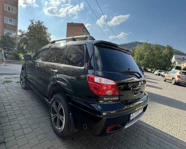 Черный Мицубиси Аутлендер, объемом двигателя 2 л и пробегом 180 тыс. км за 7300 $, фото 12 на Automoto.ua