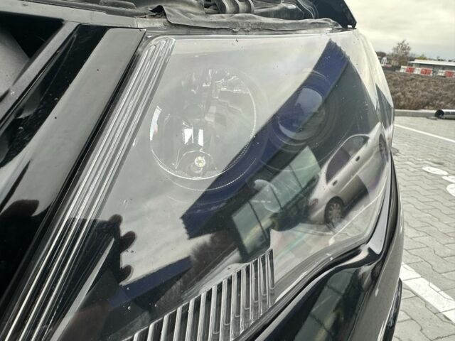 Чорний Міцубісі Аутлендер, об'ємом двигуна 2.4 л та пробігом 218 тис. км за 10000 $, фото 1 на Automoto.ua