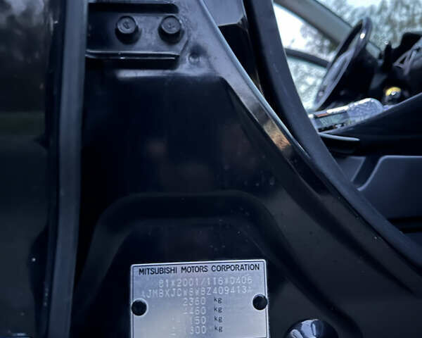 Чорний Міцубісі Аутлендер, об'ємом двигуна 1.97 л та пробігом 300 тис. км за 8600 $, фото 10 на Automoto.ua