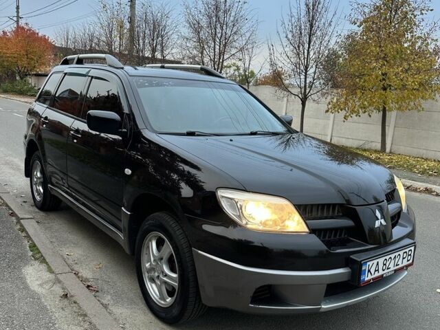 Мицубиси Аутлендер 2008 в Софіївська Борщагівка на Automoto.ua Черный Мицубиси Аутлендер, объемом двигателя 2 л и пробегом 245 тыс. км за 5900 $, фото 1 на Automoto.ua