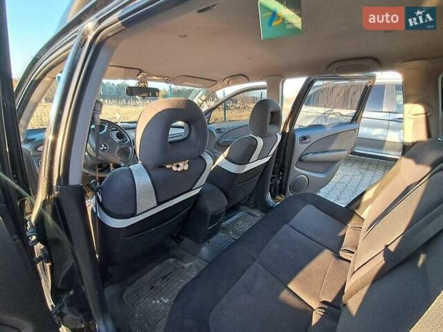 Черный Мицубиси Аутлендер, объемом двигателя 2 л и пробегом 190 тыс. км за 8000 $, фото 7 на Automoto.ua