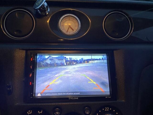 Чорний Міцубісі Аутлендер, об'ємом двигуна 2 л та пробігом 271 тис. км за 6799 $, фото 7 на Automoto.ua