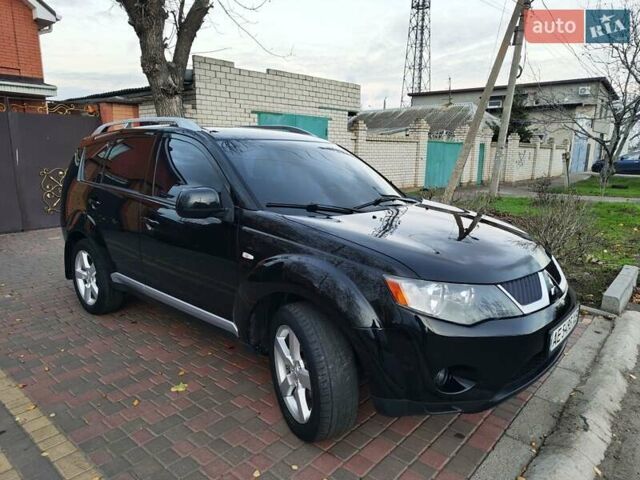 Черный Мицубиси Аутлендер, объемом двигателя 2.36 л и пробегом 192 тыс. км за 8800 $, фото 5 на Automoto.ua