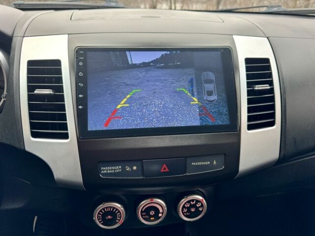 Чорний Міцубісі Аутлендер, об'ємом двигуна 2.4 л та пробігом 229 тис. км за 9790 $, фото 19 на Automoto.ua