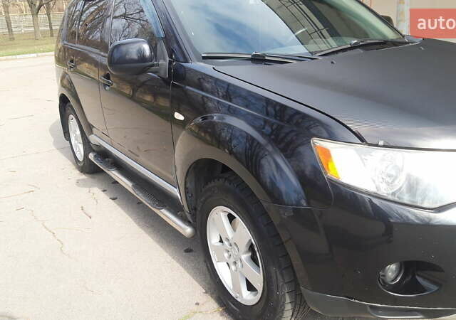Чорний Міцубісі Аутлендер, об'ємом двигуна 2.36 л та пробігом 277 тис. км за 8500 $, фото 2 на Automoto.ua