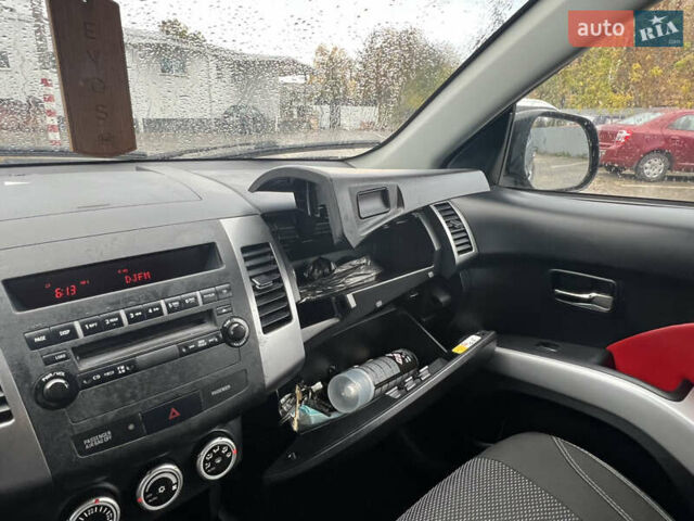 Мицубиси Аутлендер 2008 в Кременчуге на Automoto.ua Черный Мицубиси Аутлендер, объемом двигателя 2.4 л и пробегом 230 тыс. км за 6850 $, фото 40 на Automoto.ua