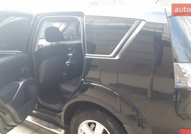 Чорний Міцубісі Аутлендер, об'ємом двигуна 2.36 л та пробігом 277 тис. км за 8500 $, фото 5 на Automoto.ua