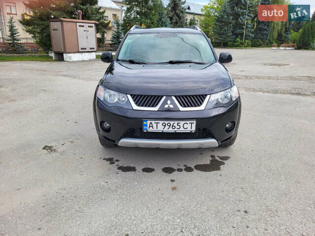 Чорний Міцубісі Аутлендер, об'ємом двигуна 2.4 л та пробігом 205 тис. км за 8400 $, фото 10 на Automoto.ua