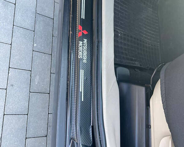 Чорний Міцубісі Аутлендер, об'ємом двигуна 2.4 л та пробігом 195 тис. км за 8600 $, фото 13 на Automoto.ua