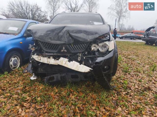 Чорний Міцубісі Аутлендер, об'ємом двигуна 2.4 л та пробігом 242 тис. км за 3400 $, фото 1 на Automoto.ua