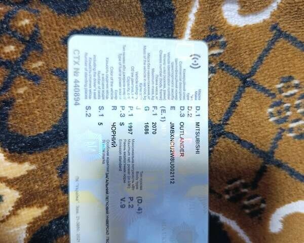 Черный Мицубиси Аутлендер, объемом двигателя 2 л и пробегом 263 тыс. км за 6900 $, фото 2 на Automoto.ua