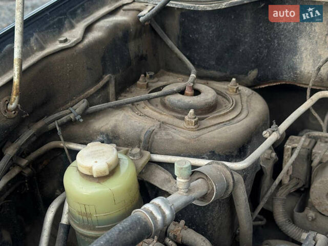 Черный Мицубиси Аутлендер, объемом двигателя 2 л и пробегом 240 тыс. км за 5500 $, фото 23 на Automoto.ua