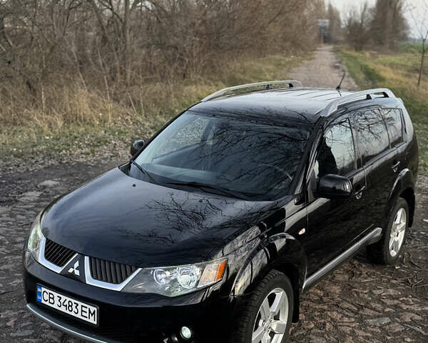 Чорний Міцубісі Аутлендер, об'ємом двигуна 2.36 л та пробігом 293 тис. км за 7900 $, фото 1 на Automoto.ua