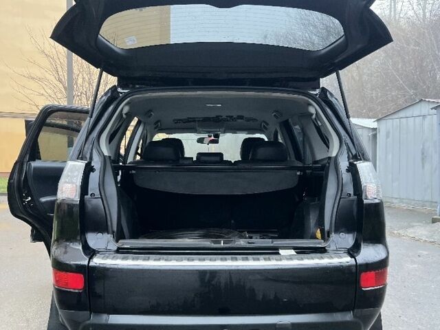 Чорний Міцубісі Аутлендер, об'ємом двигуна 2 л та пробігом 330 тис. км за 4900 $, фото 7 на Automoto.ua