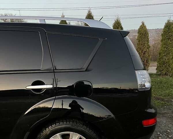 Черный Мицубиси Аутлендер, объемом двигателя 2.2 л и пробегом 310 тыс. км за 9700 $, фото 12 на Automoto.ua