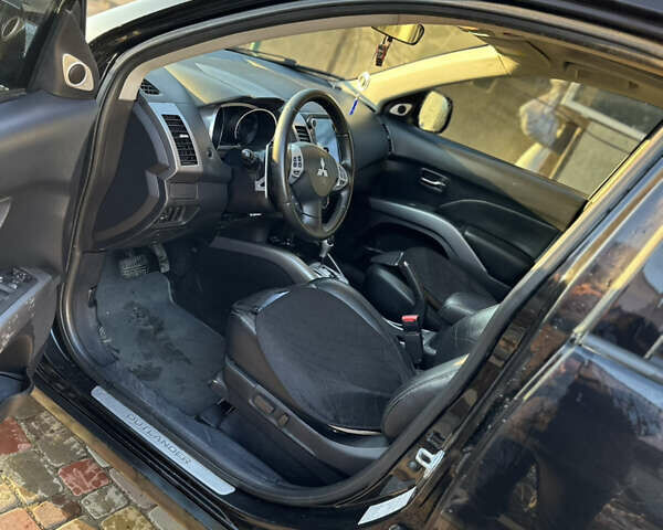 Черный Мицубиси Аутлендер, объемом двигателя 2.36 л и пробегом 253 тыс. км за 9600 $, фото 8 на Automoto.ua