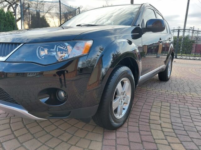Черный Мицубиси Аутлендер, объемом двигателя 2 л и пробегом 249 тыс. км за 8750 $, фото 15 на Automoto.ua