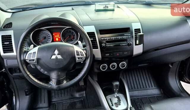 Чорний Міцубісі Аутлендер, об'ємом двигуна 2.4 л та пробігом 230 тис. км за 9700 $, фото 13 на Automoto.ua