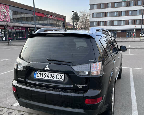 Черный Мицубиси Аутлендер, объемом двигателя 2.4 л и пробегом 237 тыс. км за 5000 $, фото 8 на Automoto.ua