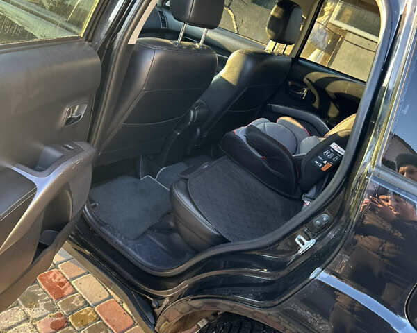 Черный Мицубиси Аутлендер, объемом двигателя 2.36 л и пробегом 253 тыс. км за 9600 $, фото 10 на Automoto.ua