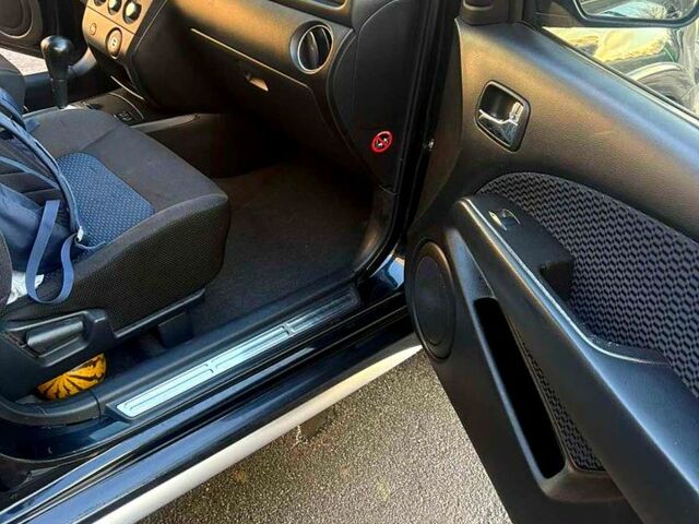 Черный Мицубиси Аутлендер, объемом двигателя 2.4 л и пробегом 231 тыс. км за 8500 $, фото 10 на Automoto.ua