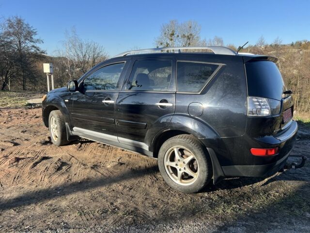 Черный Мицубиси Аутлендер, объемом двигателя 2 л и пробегом 247 тыс. км за 4600 $, фото 10 на Automoto.ua