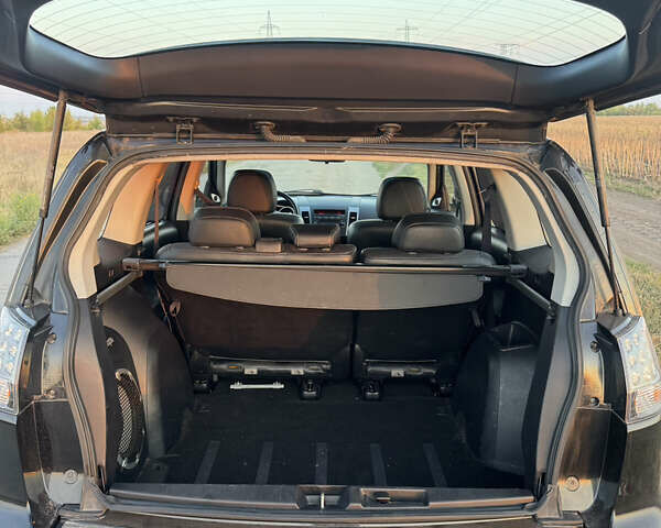 Чорний Міцубісі Аутлендер, об'ємом двигуна 3 л та пробігом 236 тис. км за 9800 $, фото 10 на Automoto.ua